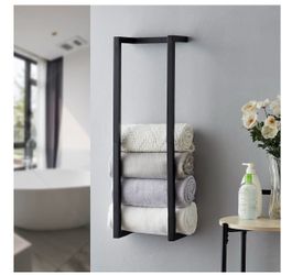 Towel rack for rolled towels