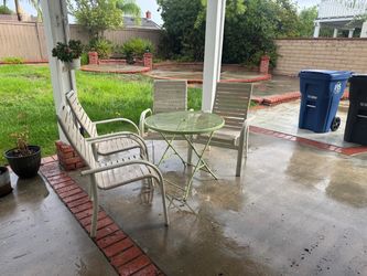 Green Patio Umbrella with Stand and outdoor table