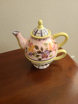 Teapot with cup