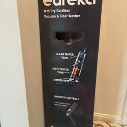 Eureka wet, dry, cordless vacuum and floor washer.. Brand new seal in box.