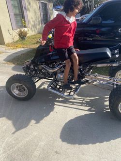 Black Sport ATV with Aftermarket Upgrades