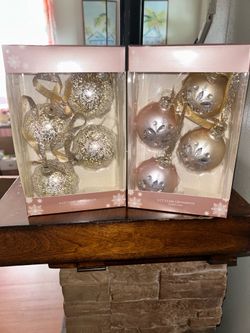 Jaclyn Smith Collection hand-blown glass ornaments with intricate snowflake designs