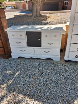 Freshly sanded and painted real wood six drawer dresse with extra storage space behind the black center door