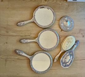 Vintage mirrors and brushes