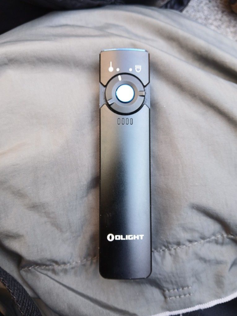 Arkfeld Olight Green Laser/flashlight
