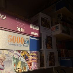 About 50 Like New Puzzles 