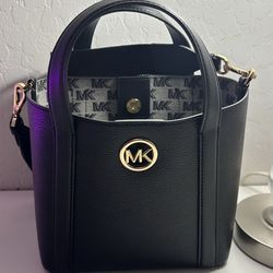 Michael Michael Kors Hadleigh Small Double Handle Tote Bag in black, crafted from pebbled leather with a gold-tone logo emblem.