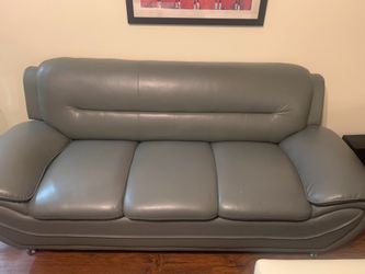 Like new Couch and loveseat with tables