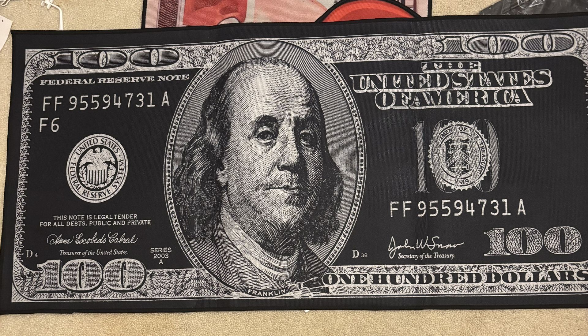 All black hundred dollar bill rug