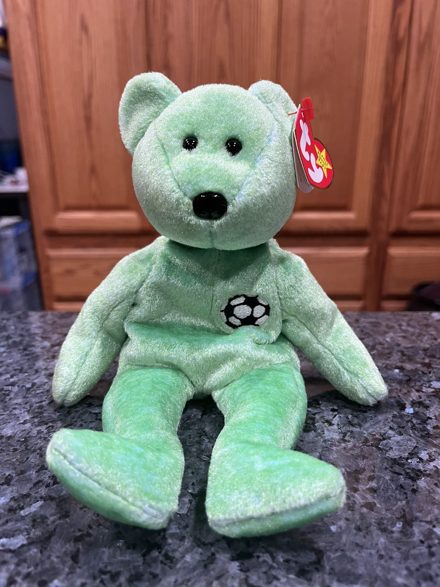 Ty Beanie Babie “Kicks ” 1998. Size 7 inches tall. Sits up. Brand New with Tags. Has been on display in a cabinet with a Ty beanie Babie collec