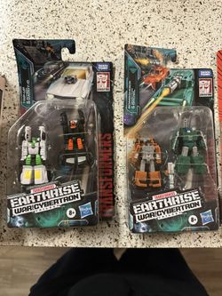 2 Two Packs Of Transformers Earthrise Action Figures 