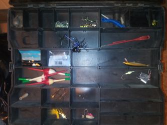 Plano tackle box with lures and misc. Fishing stuff