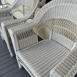 two white porch chairs