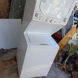 STACK UNIT FULL SIZE  27" INCHES WIDE X 70" INCHES HIGHT WORKING EXCELLENT WITH 6 MONTHS WARRANTY TOTAL PRICE $600 DOLLAR WITH DELIVERY INSTALLATION 