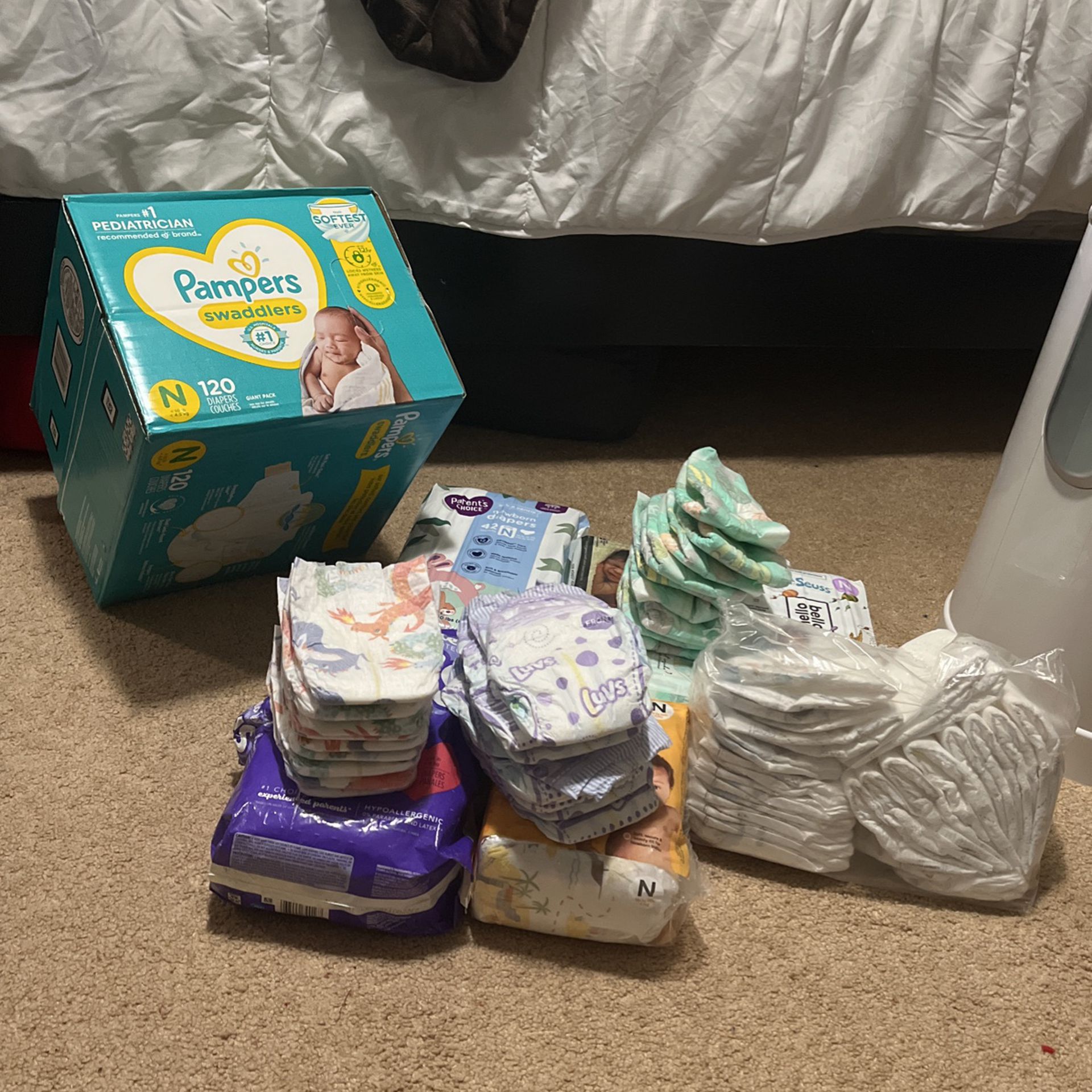 Newborn And Size 1 Diapers 