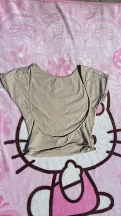 Tan open back shirt
