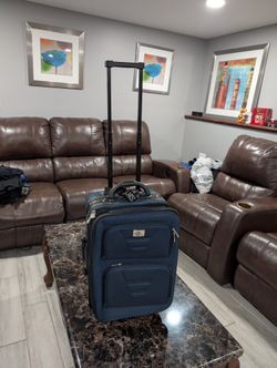 Blue carry-on suitcase