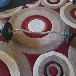 Curly bar with plates