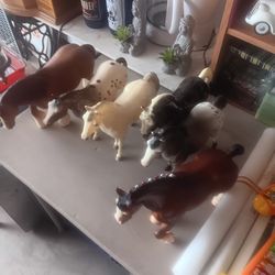 7 Figurines  Horses