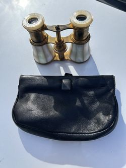 Antique Lemaire mother of pearl opera glasses in great shape with leather case.  There is a 63 embossed on them so I assume that’s when they were made