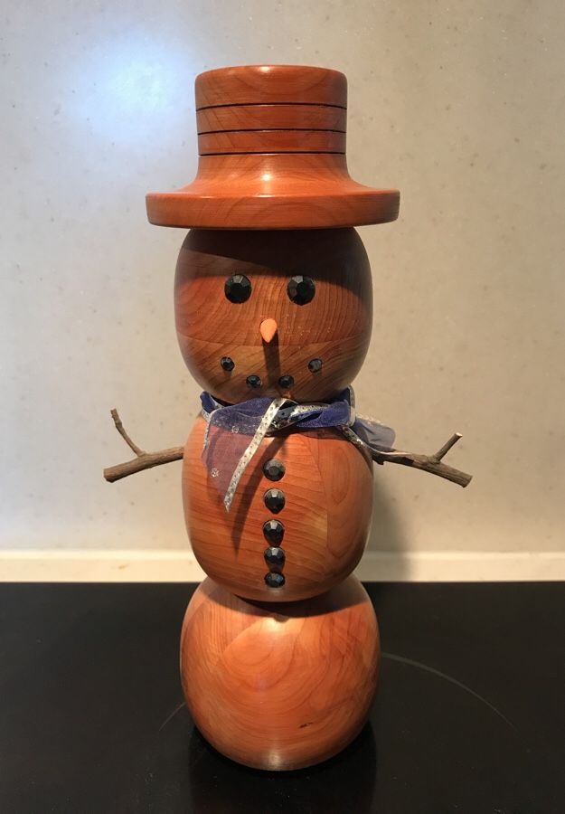 Real wooden carved snowman