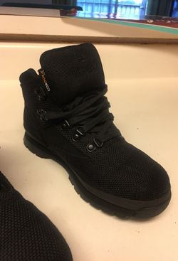 Boys black timberland boots . Good condition. Worn once. Size 3