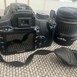 Canon EOS rebel xti W/canon lens 75-300 & 18-55