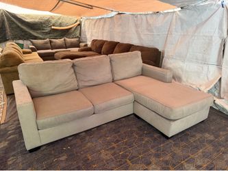 Grey couch with reversible chase good condition clean we sell all the time delivery $40 local