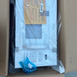 Brand New Hotpoint Microwave 