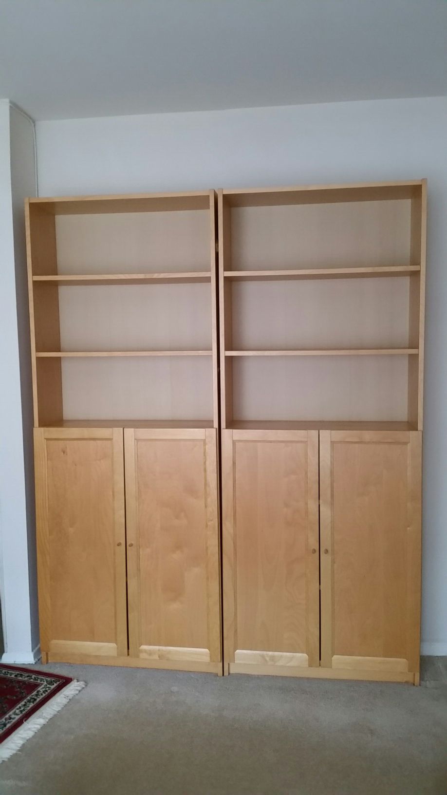 Billy Oxberg Ikea Bookcases with doors.