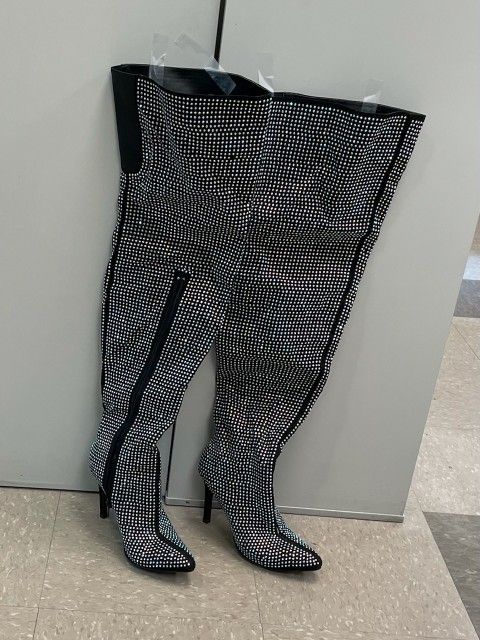 Size 7 1/2..Black thigh high boots with rhinestones. Worn Only Once. 