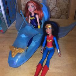 Two Super Hero Dolls And Vehicles 