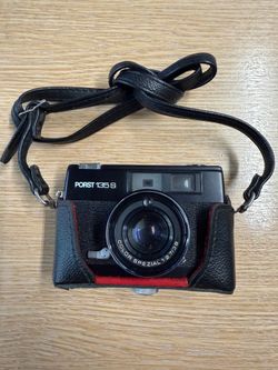 PORST vintage Japanese camera with carrying case and strap