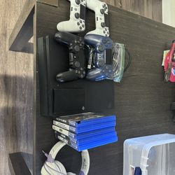 PS4 W/ 2 Terabyte Extra Storage And Games