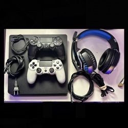 ps4 1TB,  2 controllers, 1 headphone.