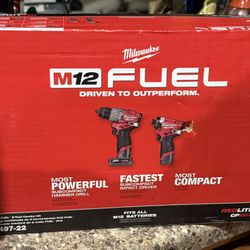 Brand New In Box  Combo Kit Milwaukee M12 Impact Driver, Hammer drill, 2 Batterie's And Chargers With A Bag