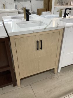 30” solid wood vanity, walnut, Quartz top, available for pick up