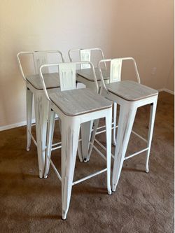 Four counter height kitchen stools chairs