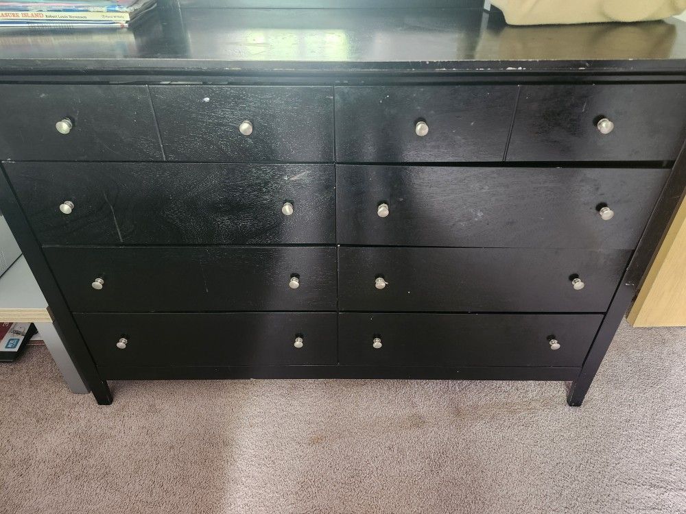 Black dresser With Marrior