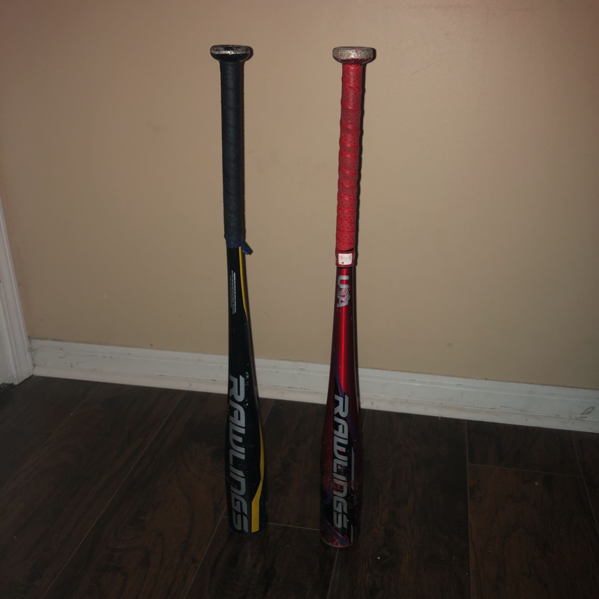 Two Rawlings Baseball Bats