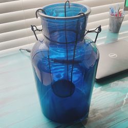 Glass vase with candle holder