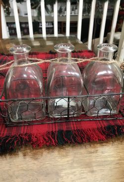 Vintage glass bottles with rack