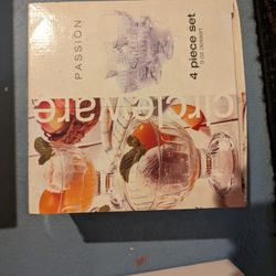 Four piece glass dessert ice cream cups. Never used.