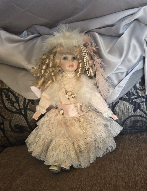 Vintage Porcelain Doll $25