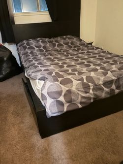 Black wood Queen size bed frame with 2 drawers and a Zinus 8 inch gel infused Green tea memory foam mattress.