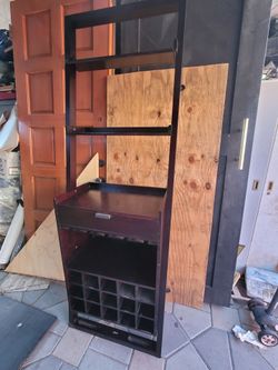 Crate and barrel vine storage cabinet shelves glass holder