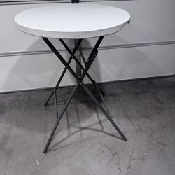 Bar height protable cocktail table.