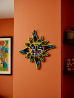 Mexican Huichol hand-beaded sun wall sculpture features intricate colorful beads 8"×8"