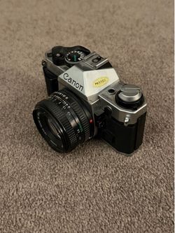 Canon AE-1 Program with 50mm 1.8 lens.