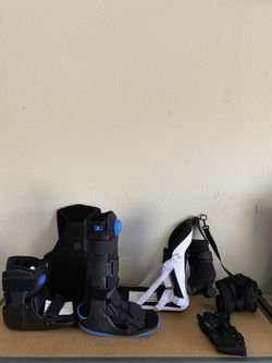 New (sold short cam boot on left) medical braces ankle, knee , cam boots, elbow and night splint